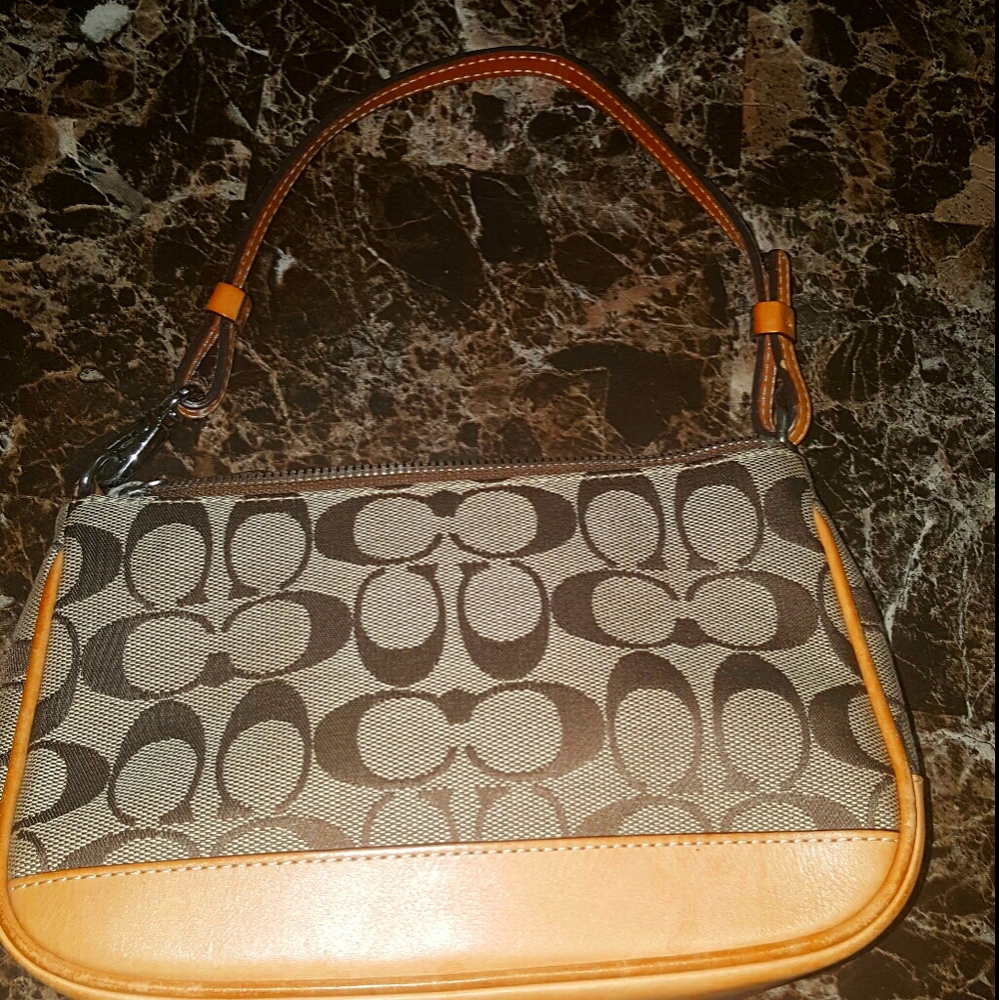 Coach pochette like new